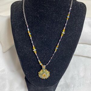 Elegant Multicolor Beaded Necklace with Floral Pendant